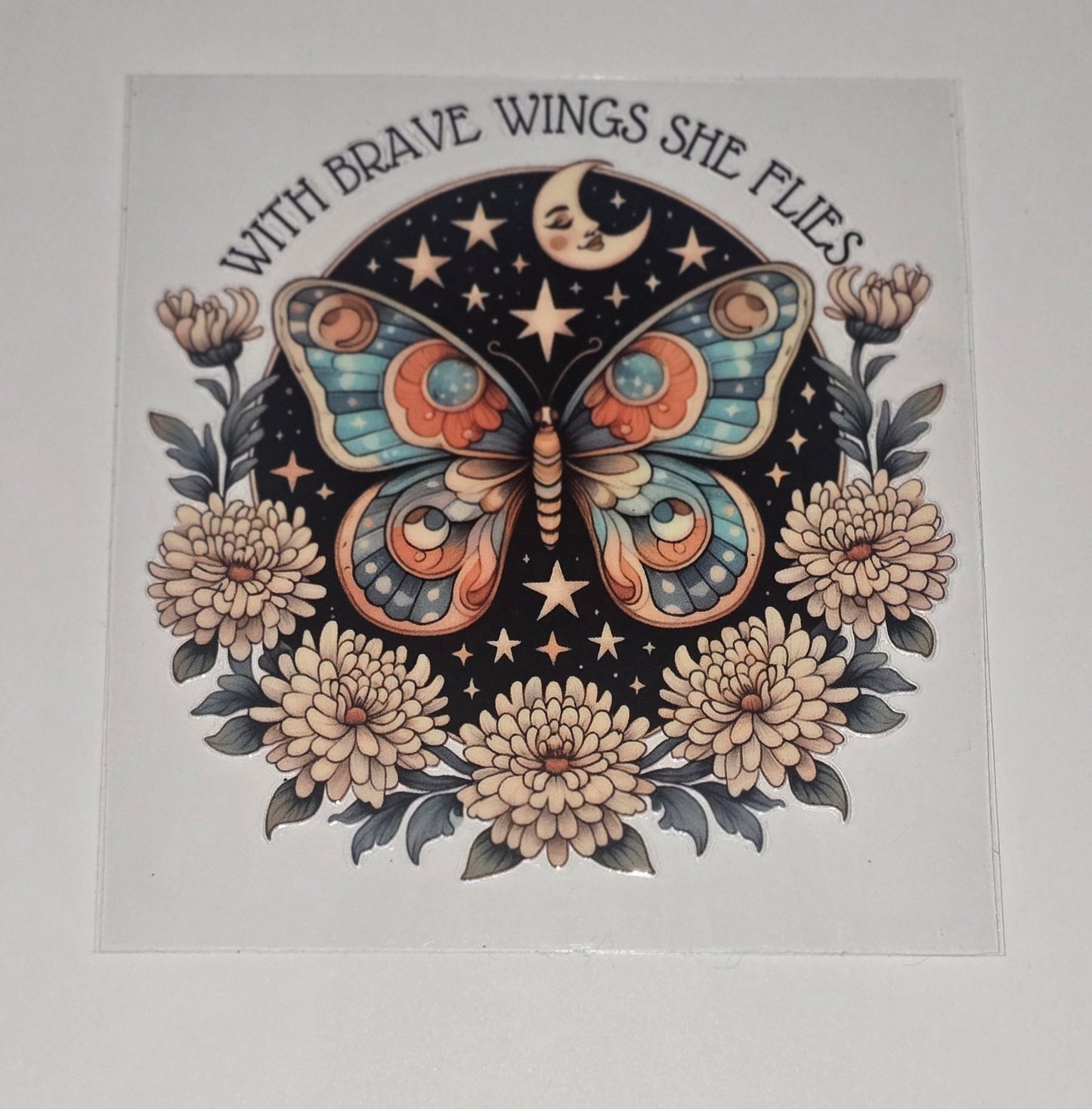 With Brave Wings She Flies